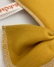 עפיפון קיר עם פרטי הבייבי - חרדל